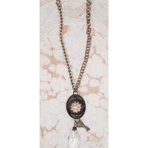 Golden Echo | ReTold | Pearl Pin on Keyhole Cover with Prism and Key